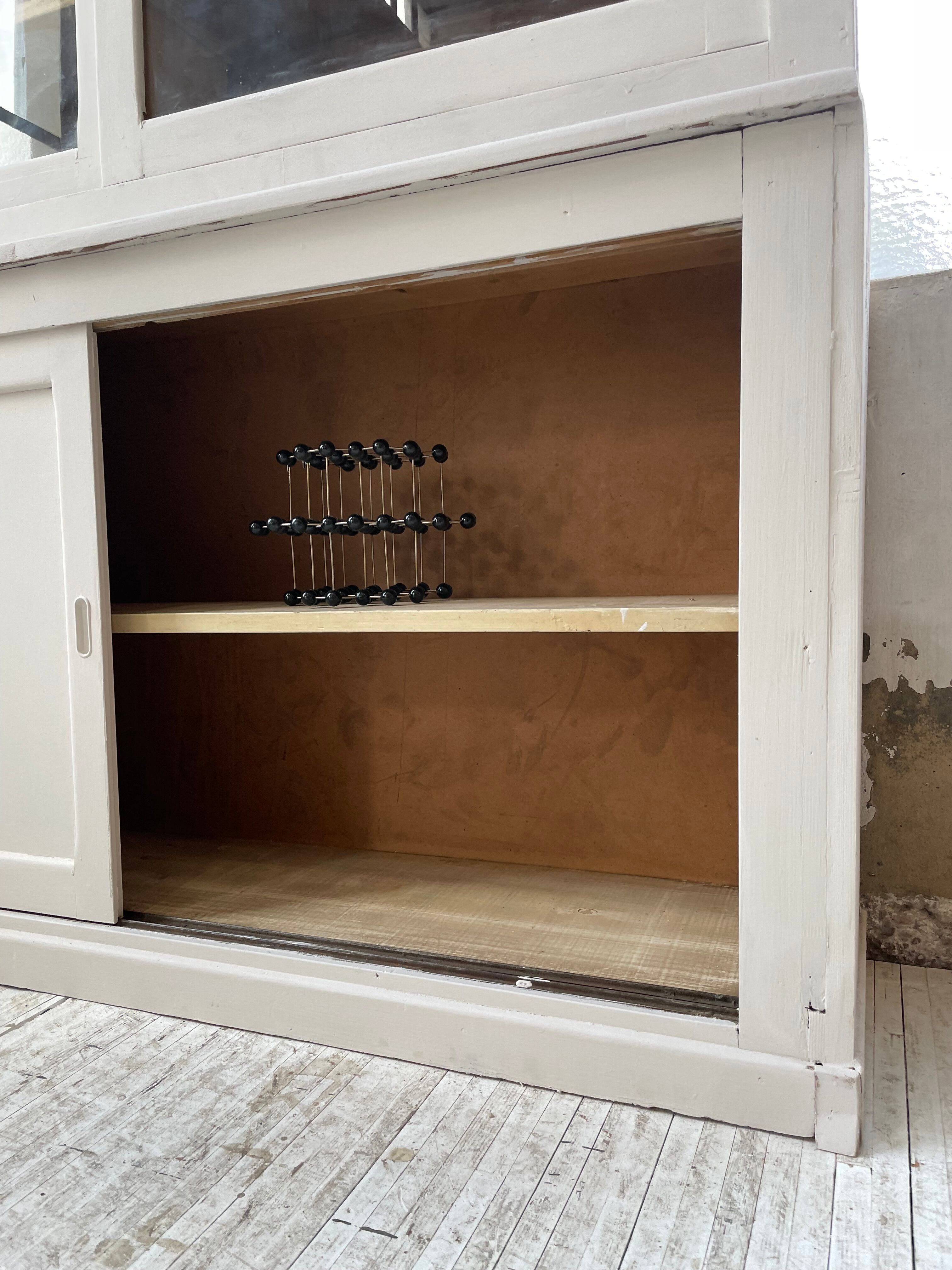 Library showcase ivory white sliding doors