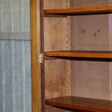 Light wood library with a secretary and leather surface.