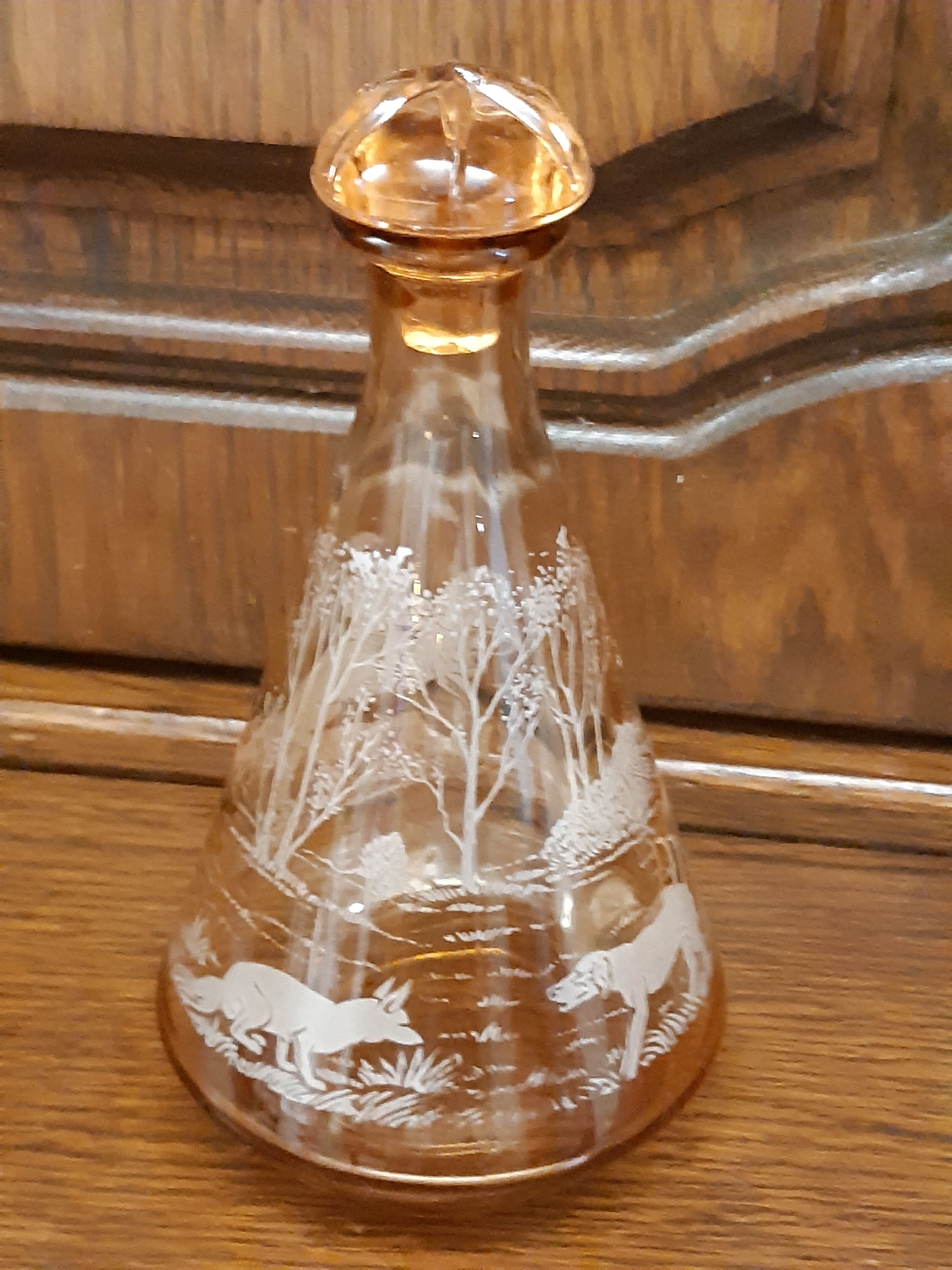 Moulded blown glass decanter with equestrian fox hunting décor, belle époque