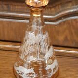 Moulded blown glass decanter with equestrian fox hunting décor, belle époque