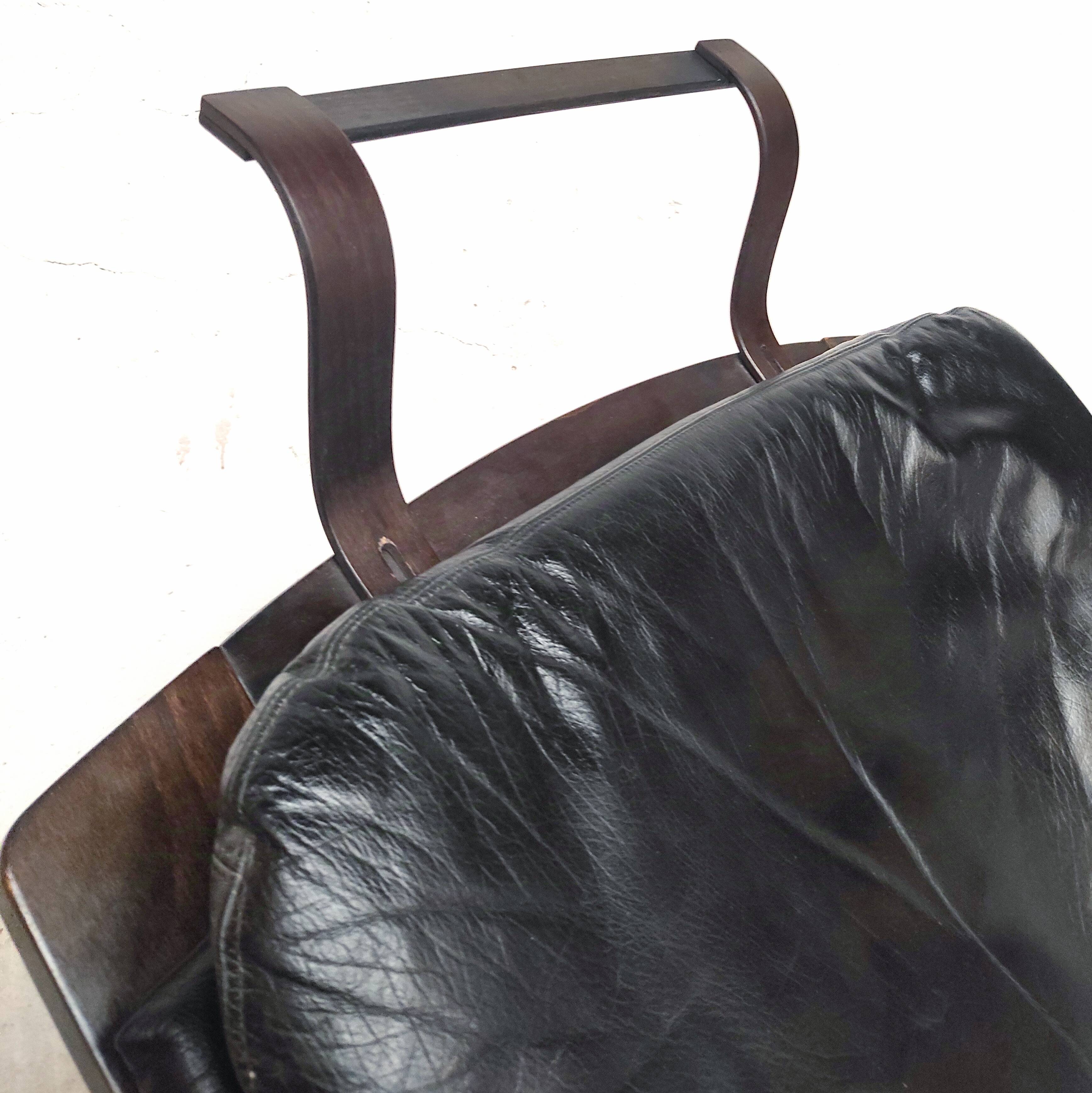 Pair of Kroken armchairs in black leather