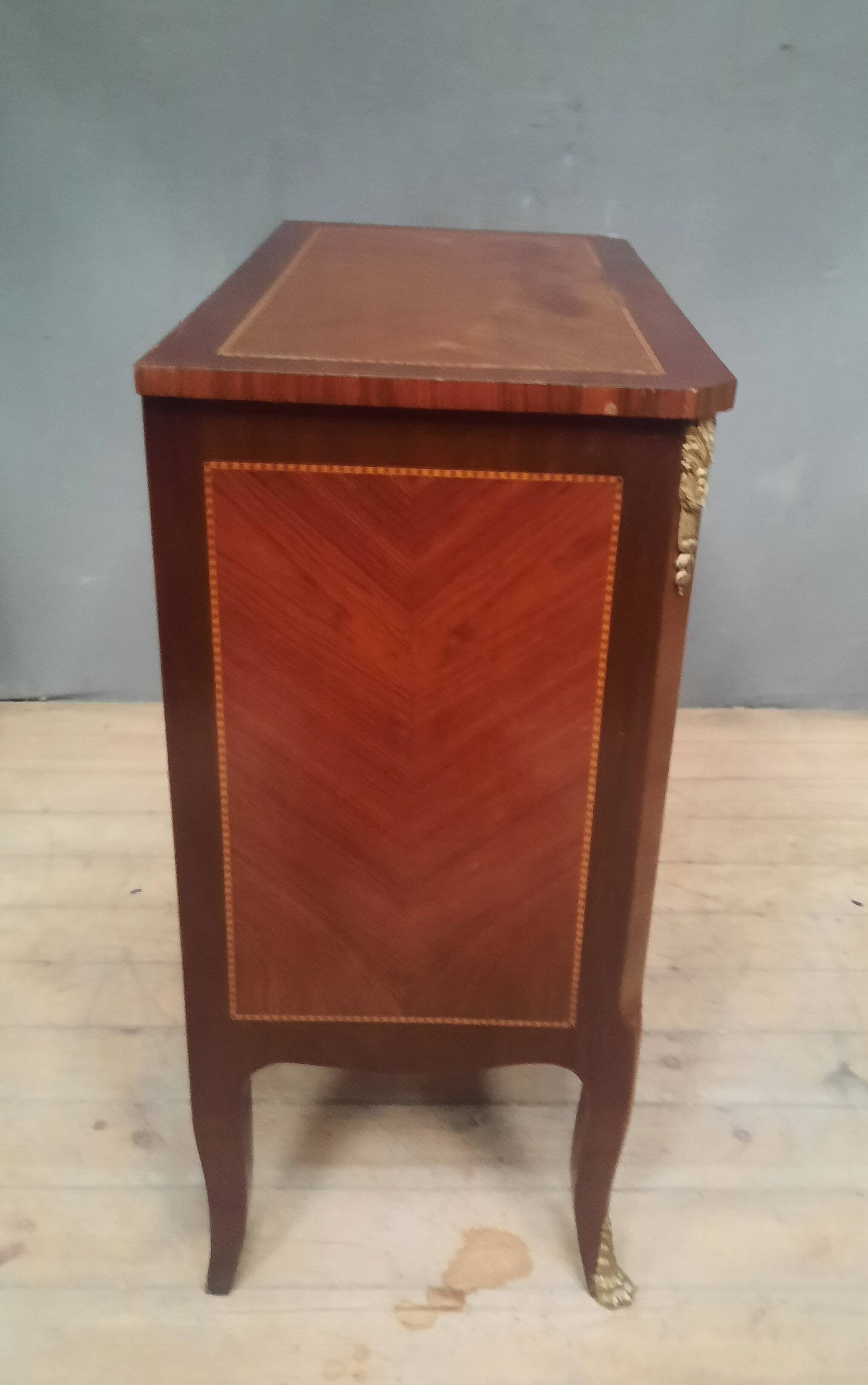 Small transitional style inlaid chest of drawers