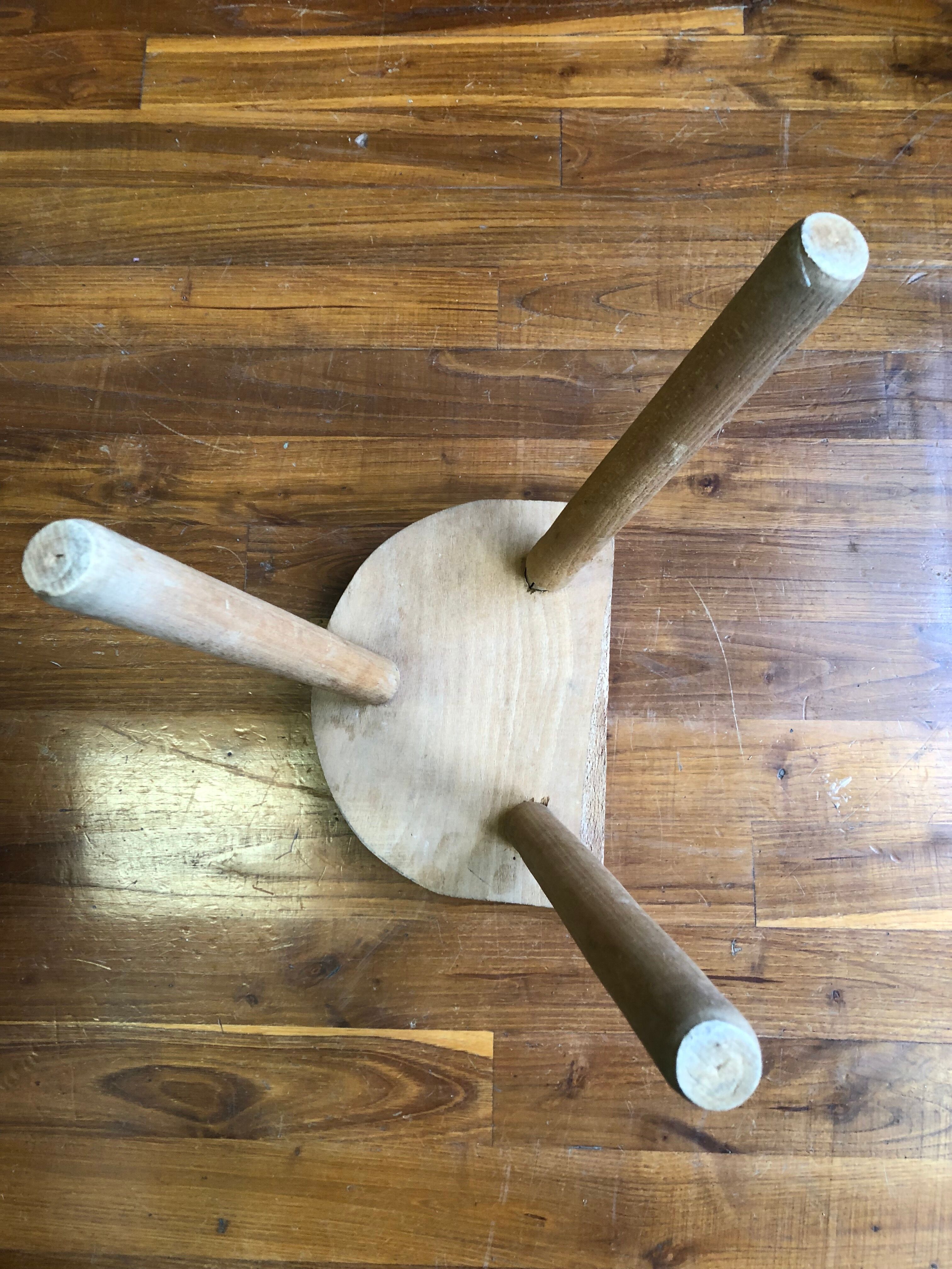 Wooden tripod stool