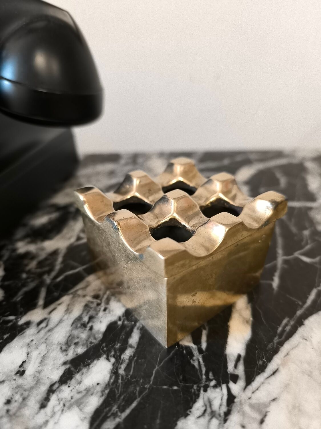 Ultima ashtray in gold-plated brass designed by Holger Bäckström & Bo Ljungberg.