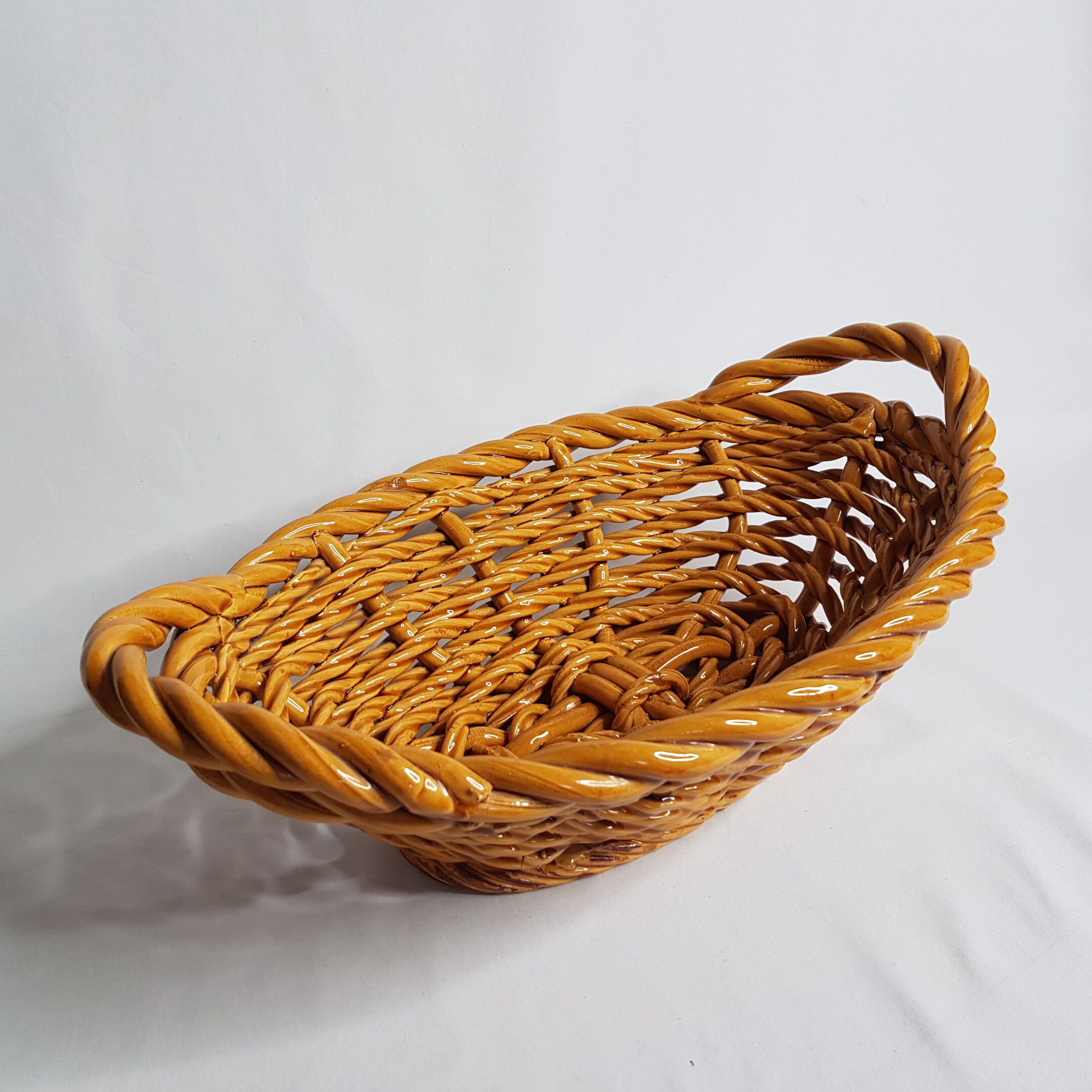 Fruit basket in golden yellow braided dab
