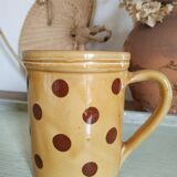 Old pitcher or polka dot vase
