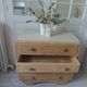Vintage oak chest of drawers, a travertine plate laid for tray.