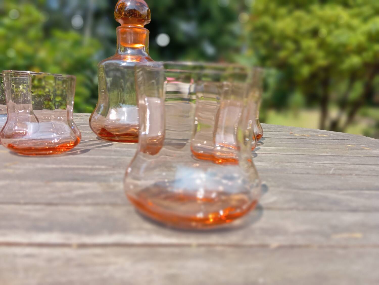 Retro whiskey set with pink glass, decanter and 5 glasses