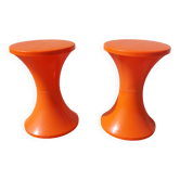 pair of orange tam-tam stools