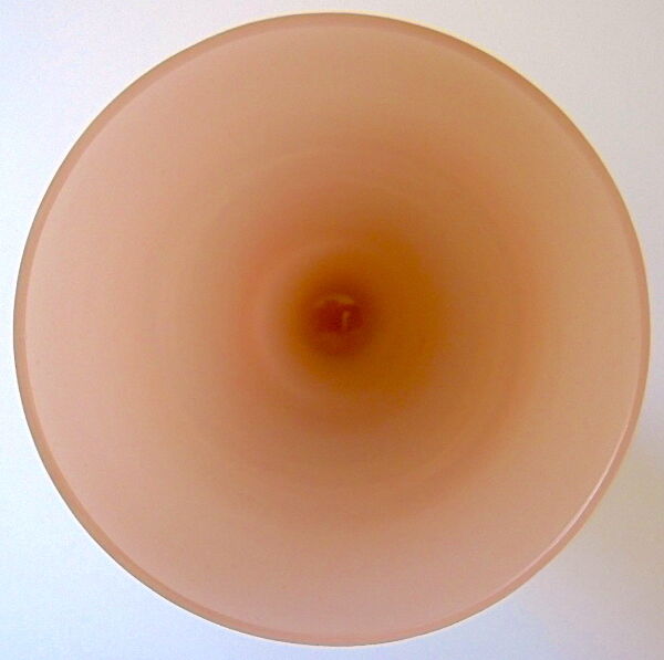 Ancient conical vase on pink soapy opaline feet