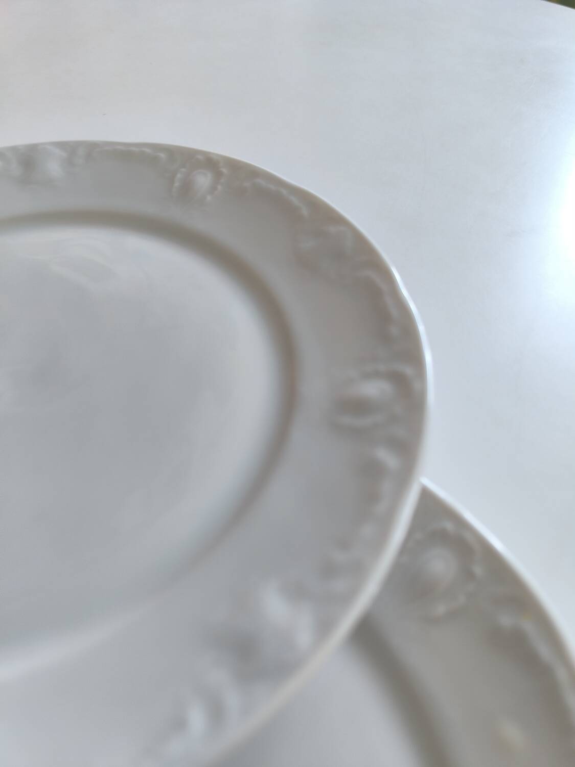 Set of five porcelain dessert plates