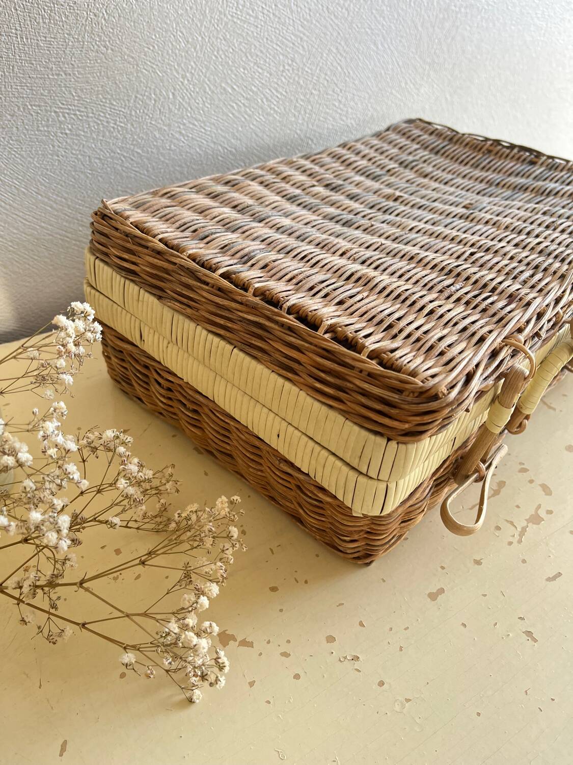 Vintage woven wicker suitcase