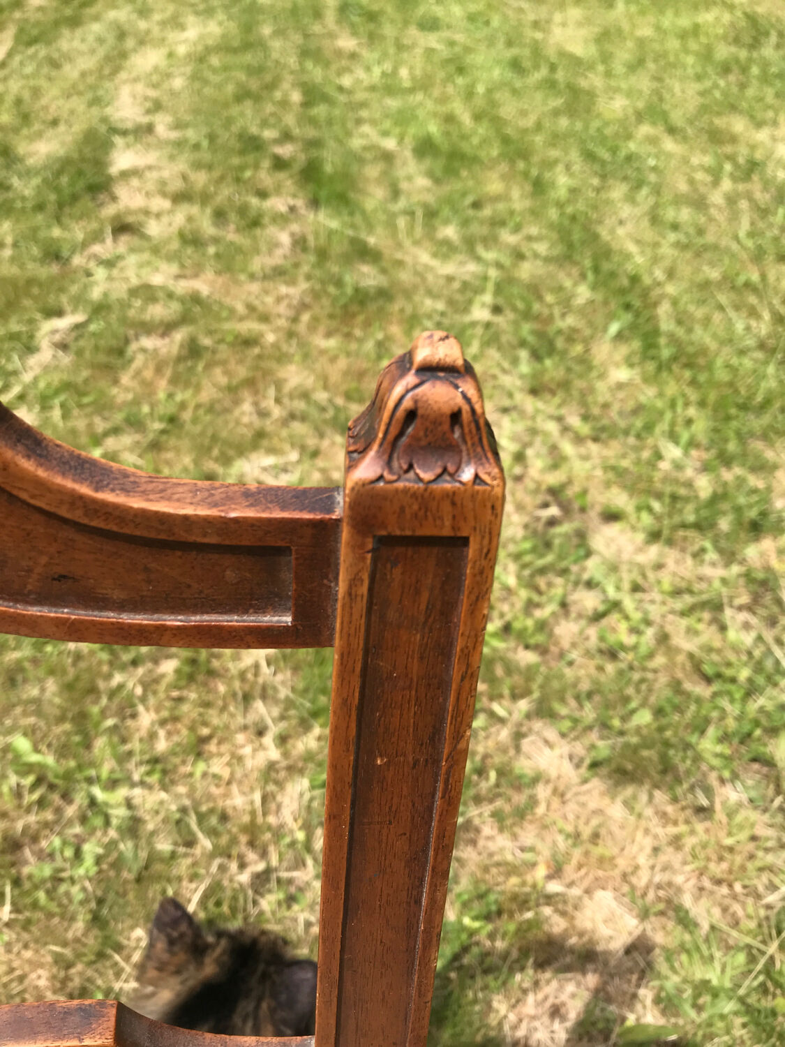 Antique chair seat upholsterer medallions