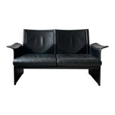 Small vintage black faux leather sofa