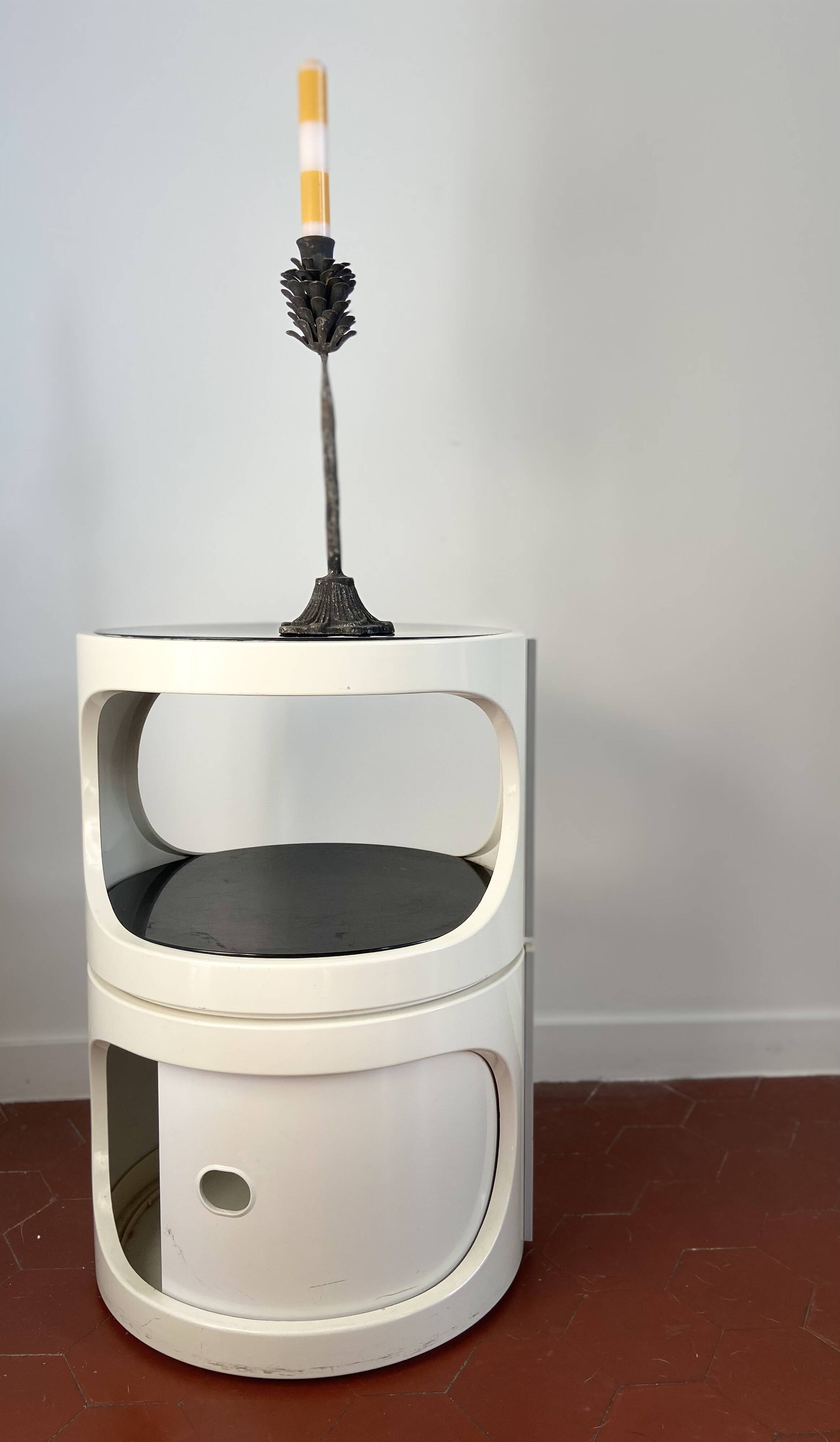 Metal pine cone candle holder