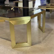 Octagonal brass coffee table, signed Anna Nora.