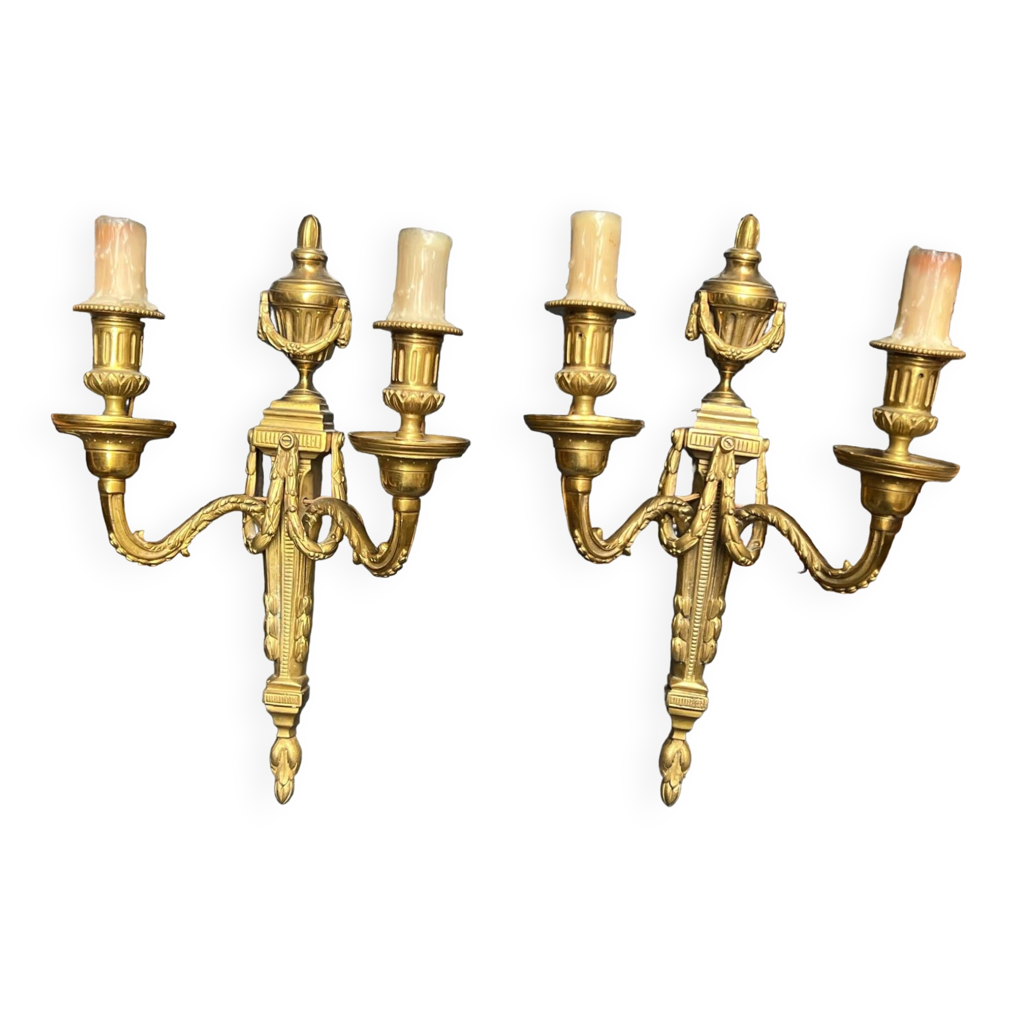 Pair of wall lights. Solid gilded bronze.