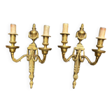 Pair of wall lights. Solid gilded bronze.