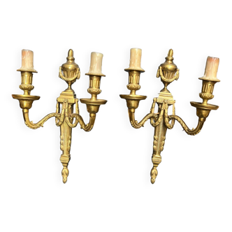 Pair of wall lights. Solid gilded bronze.