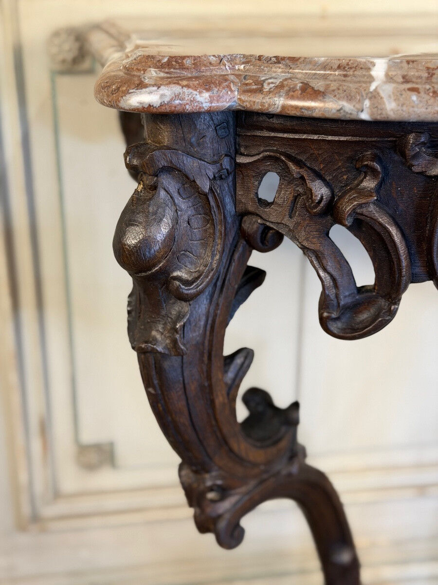 Console Louis XV en chêne sculpté, patine noire, XVIIIeme siècle