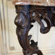 Console Louis XV en chêne sculpté, patine noire, XVIIIeme siècle