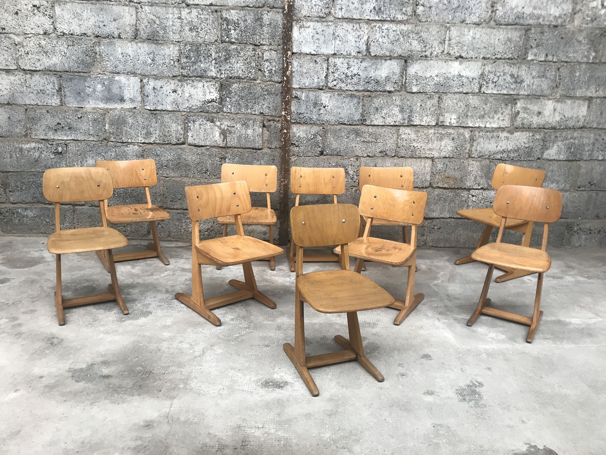 Series of 10 casala children's chairs in vintage light wood