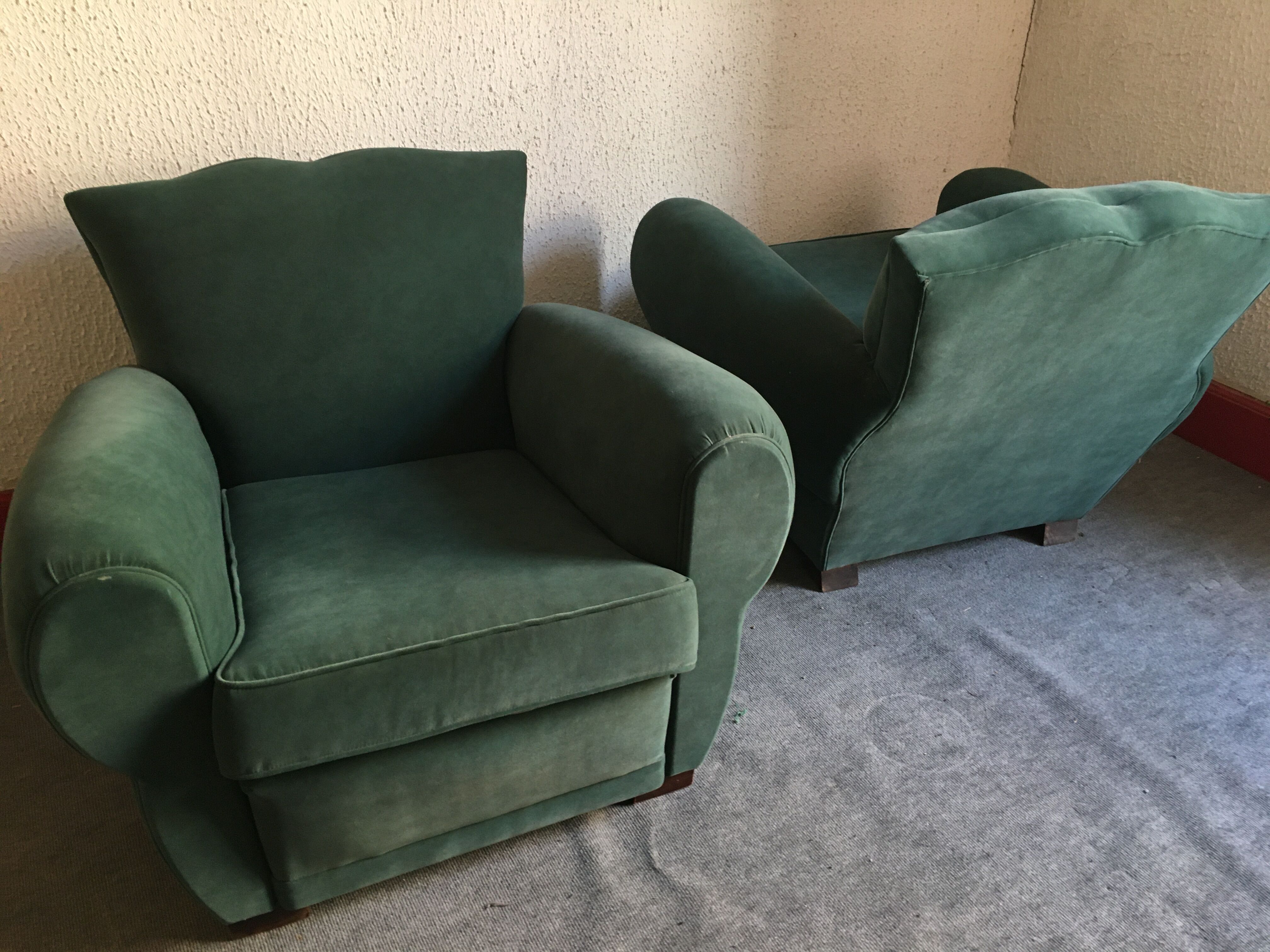 Pair of club armchairs with mustache