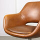 Mid-century brown leatherette swivel chair from Stol