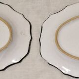 Pair of oval dishes in hand-painted faience with an Italian majolica spirit.