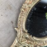 Bronze "face to hand" mirror