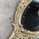 Miroir "face à main" en bronze