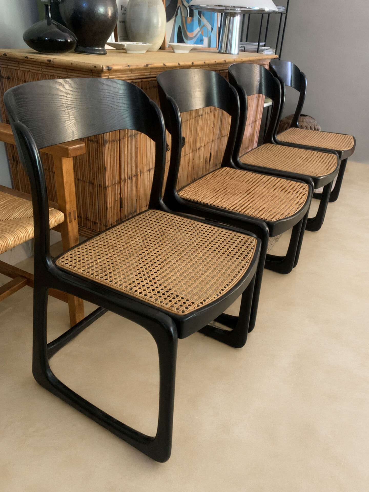 Set of 4 Baumann sled chairs with caning.