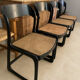 Set of 4 Baumann sled chairs with caning.