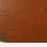 French rustic low church stool in terracotta painted wood, ca. 1900