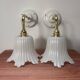 Pair of white tulip wall sconces
