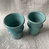 Two lovely turquoise ceramic mug vases.