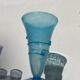 Conical vase in turquoise blue bubbled glass