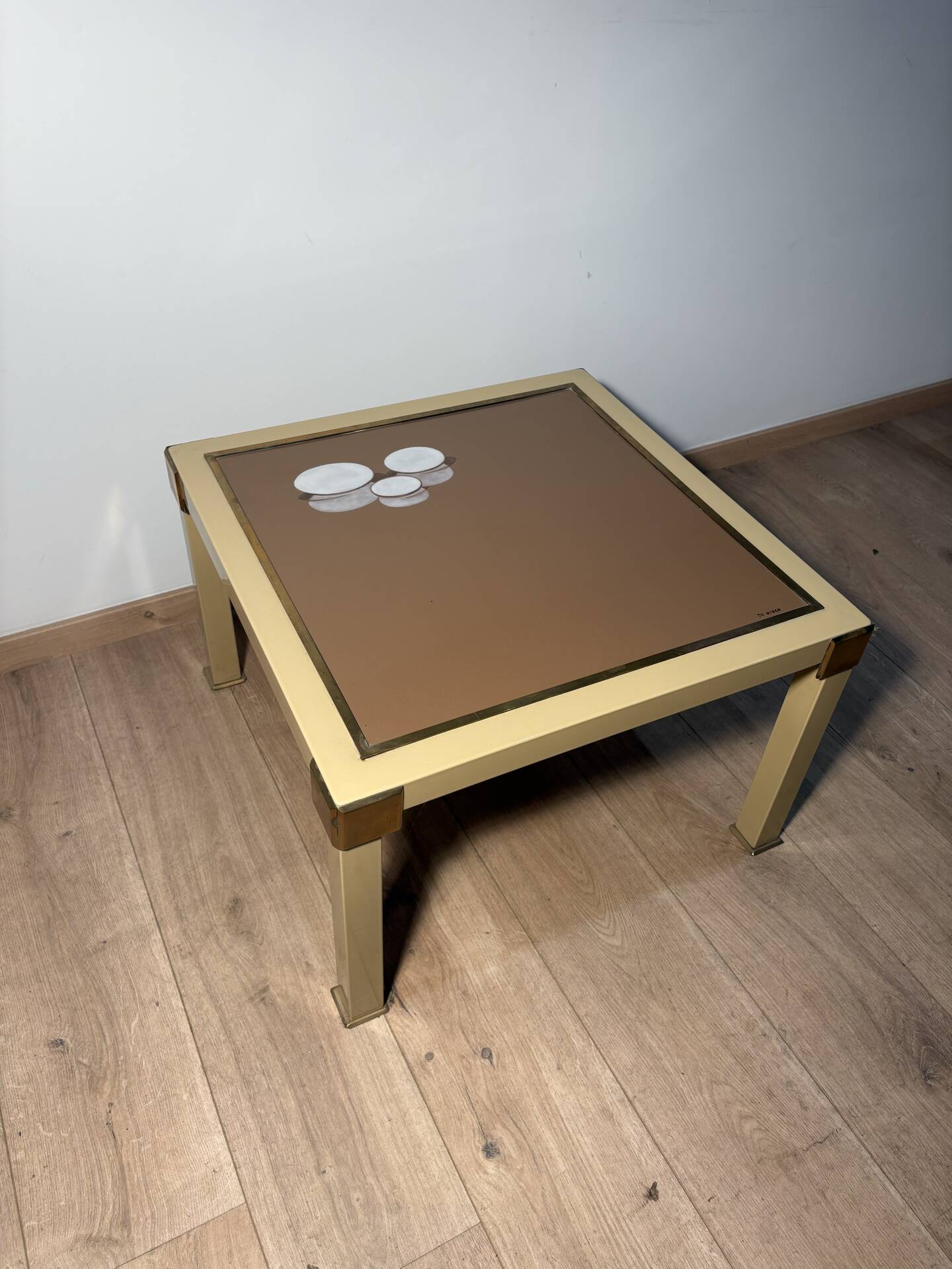 Metal and brass coffee table in ceramic by Nisco.