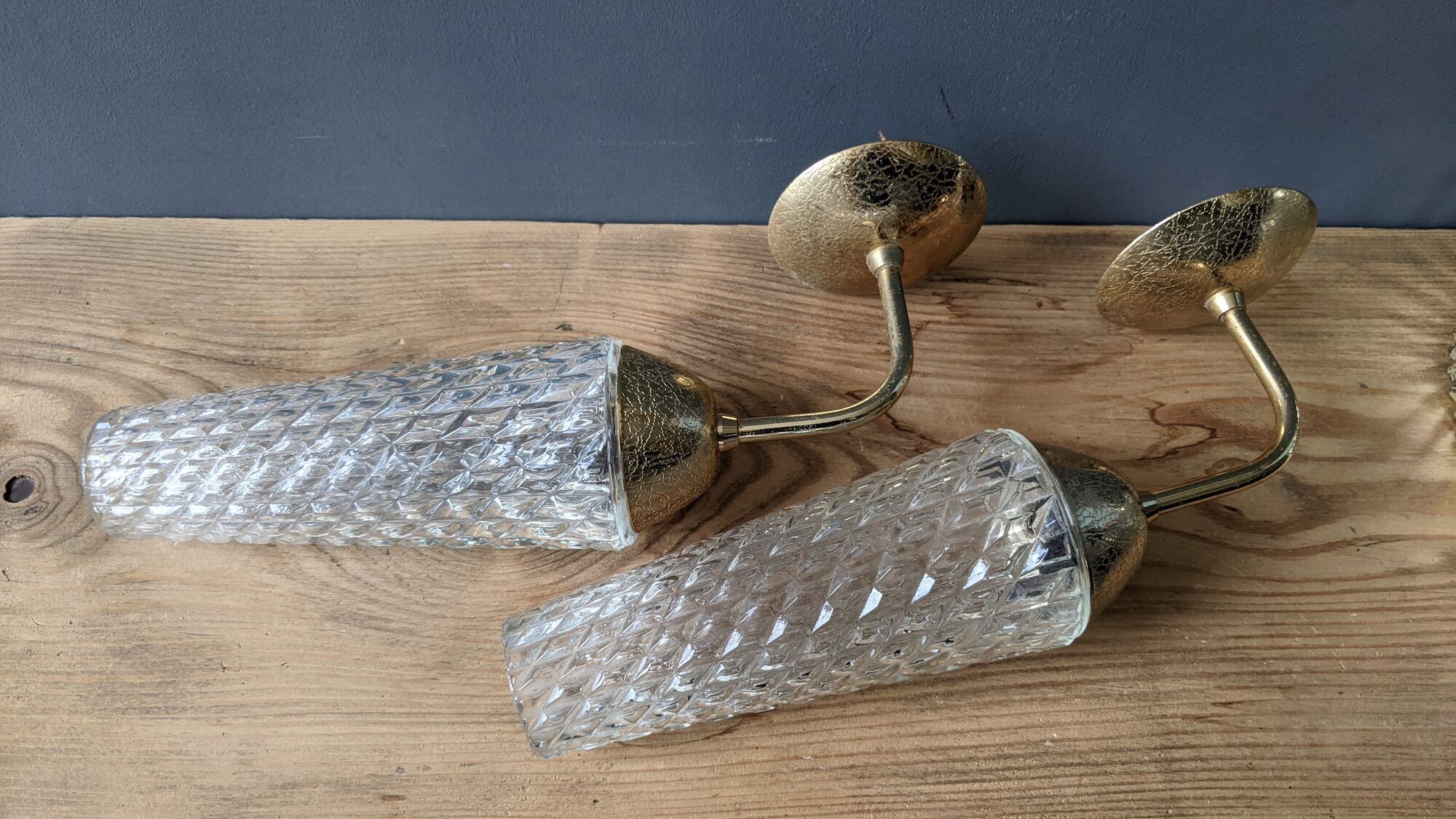 Old pair of vintage wall lamps gold metal and glass