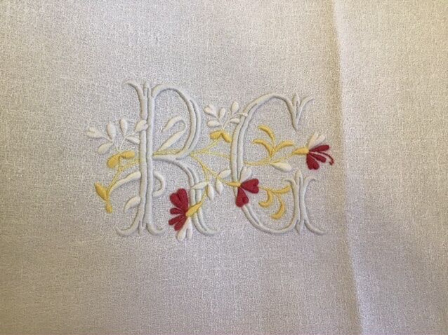 Linen table centre marked "RG" 70cmx84cm