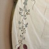Gilded bronze mirror and screen-printed glass with flower motif