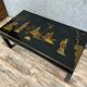 Chinese coffee table in black lacquer and colored mother-of-pearl decorations