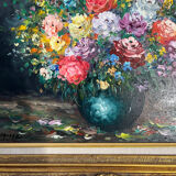 Framed bouquet of flowers, oil on canvas signed R Mogisse.