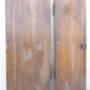 Pair of antique cherry wood cabinet doors from the 19th century in their original part