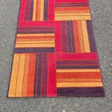 Persian tufted wool rug with geometric stripes in burgundy and brown 140x80