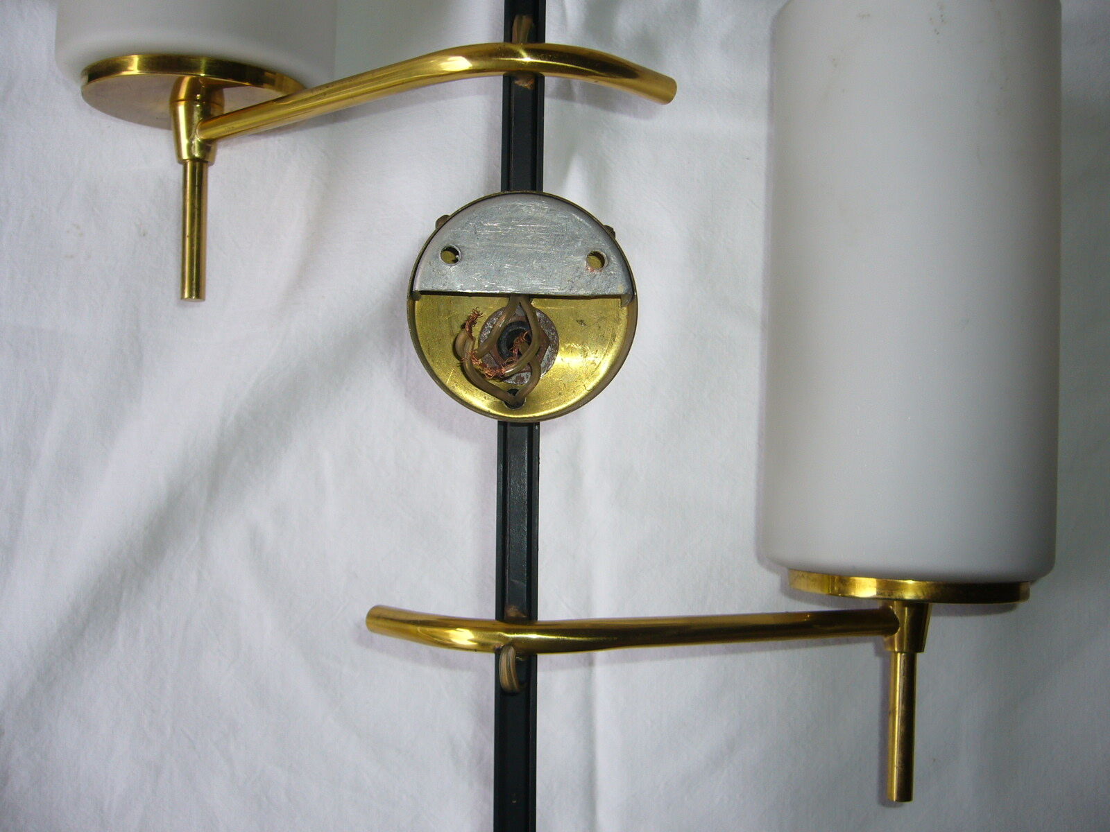 Black and gold metal sconces, Arlus house opalin lenses from the 1950s
