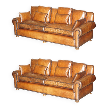 Pair of Ralph Lauren Jamaica club sofas restored in leather.