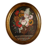 Ancient table vase with Medici flowers on a marble table, French school.