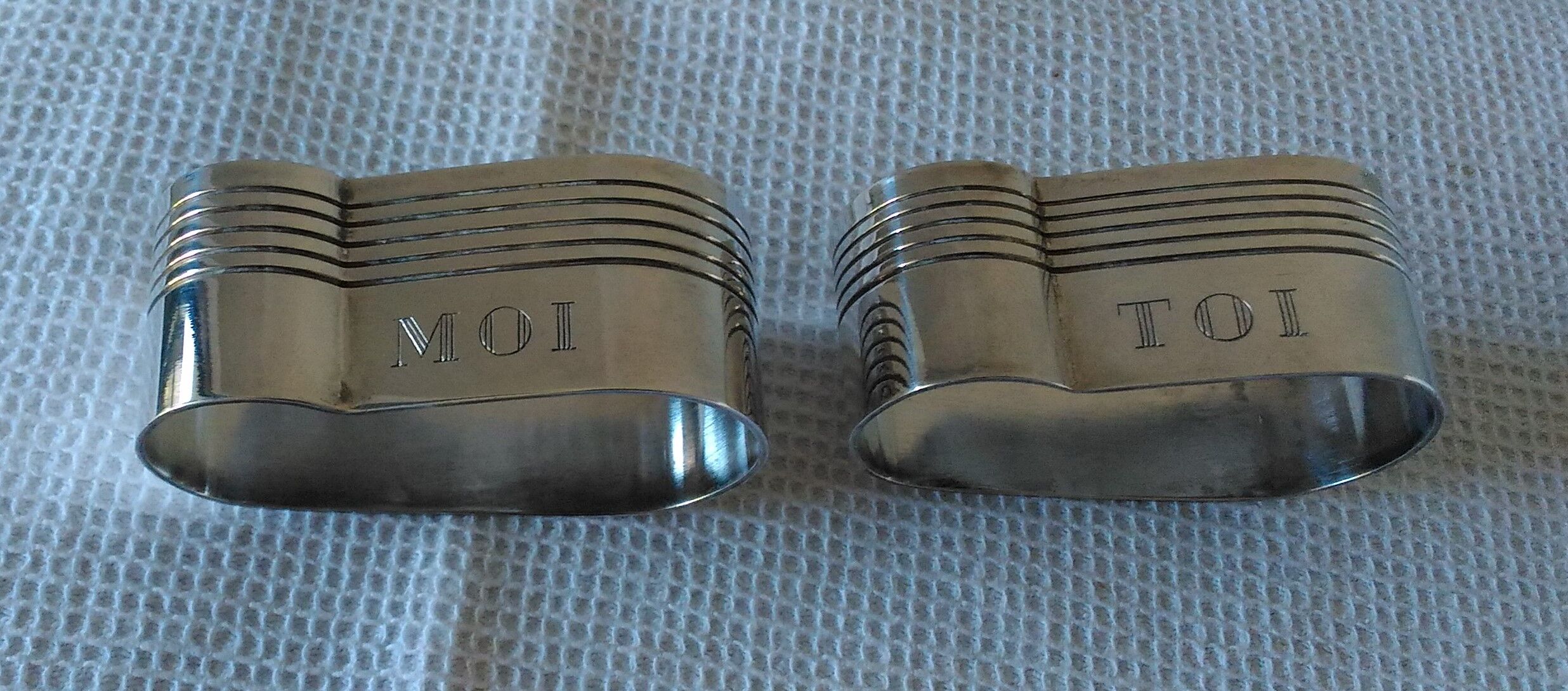 Duo of silver metal towel rings Art Deco style