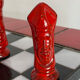 Chess set with ceramic board and pieces.